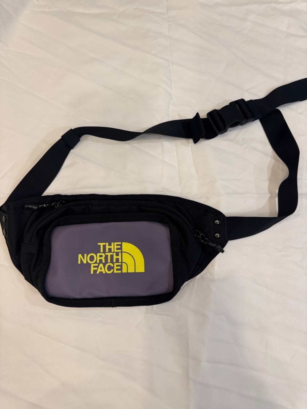 The North Face Black and Purple Belt Bag with Yellow Logo